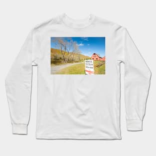 Honor system sign for tomatoes in rural New England beside an American style red barn by a river. Long Sleeve T-Shirt